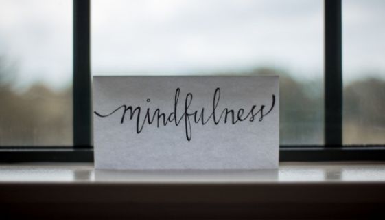 A piece of paper with the word 'Mindfulness' written on it