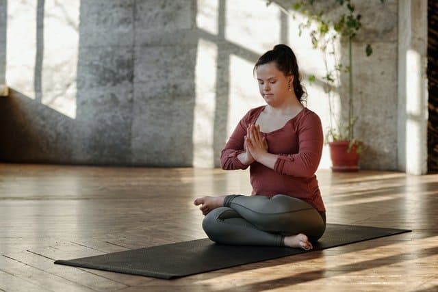 A girl holding a yoga pose