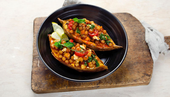 Baked sweet potato with tomatoes and chickpeas