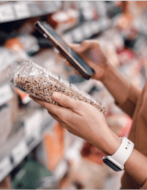 Woman looking at spices in the grocery store